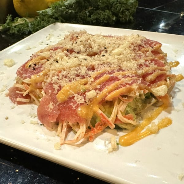 Ninja Sushi & Hibachi's tuna salad with crispy tempura flakes and spicy mayo drizzle.